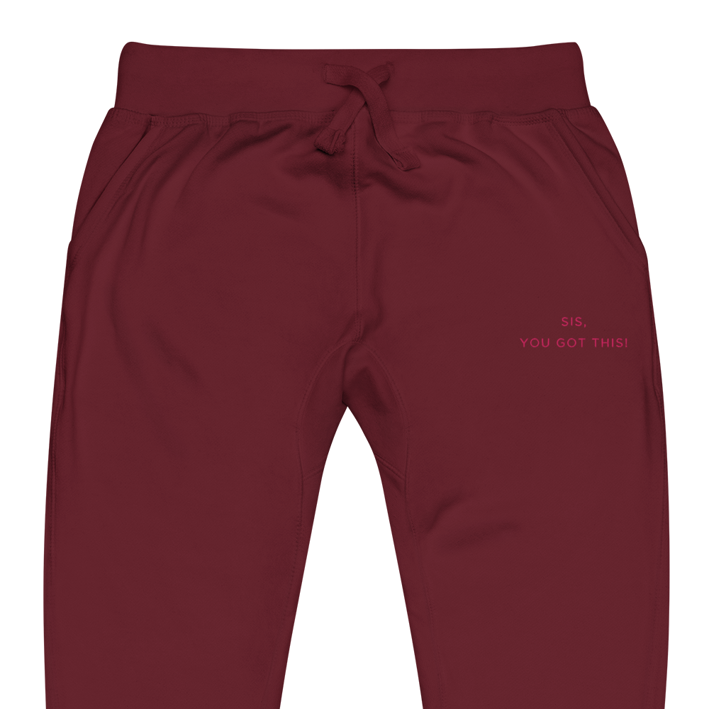 Maroon sweatpants with text that reads, sis, you got this on a white background