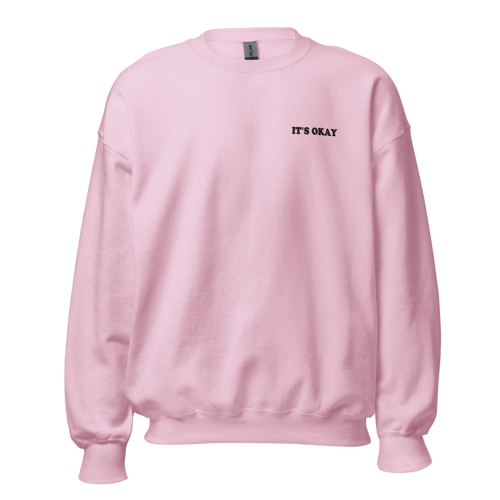 Pink sweatshirt with embroidered 'IT'S OKAY' text on a white background