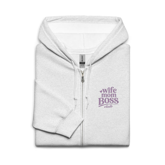 Folded grey hoodie with 'Wife Mom Boss Club' embroidered  text in lavender on a white background